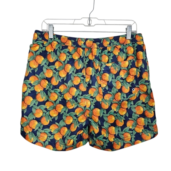 Vibrant Orange and Green Pineapple Swim Trunks - Picture 2 of 3
